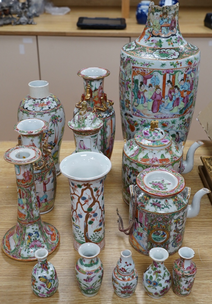 A group of 19th century and later Chinese famille rose porcelain vases and teapots, tallest 39cm high. Condition - poor